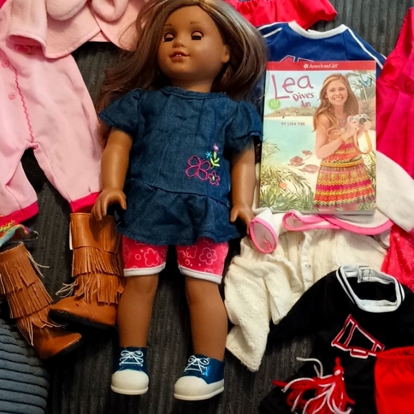 American Girl Other - American girl doll with book and a bunch of clothes